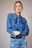 NEW!! Chic Denim Tie Neck Top sold by Glitzy Bella