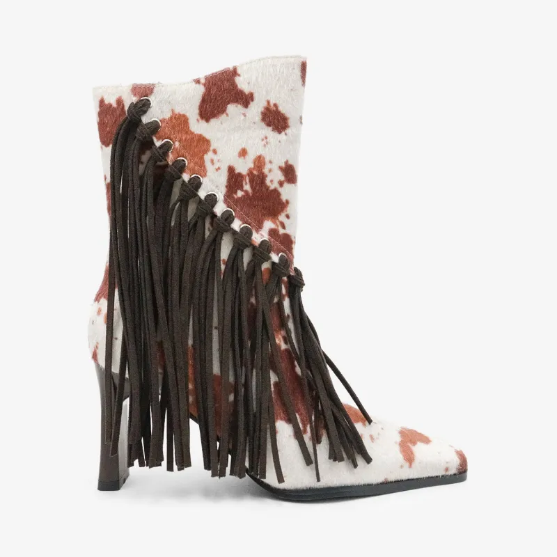PREORDER!! Sundance Fringe Boots in Cowprint sold by Glitzy Bella