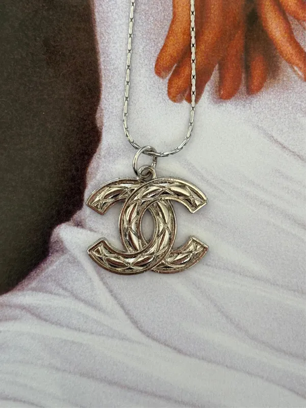 NEW!! Authentic Vintage Queenie Pendant in Silver sold by Glitzy Bella