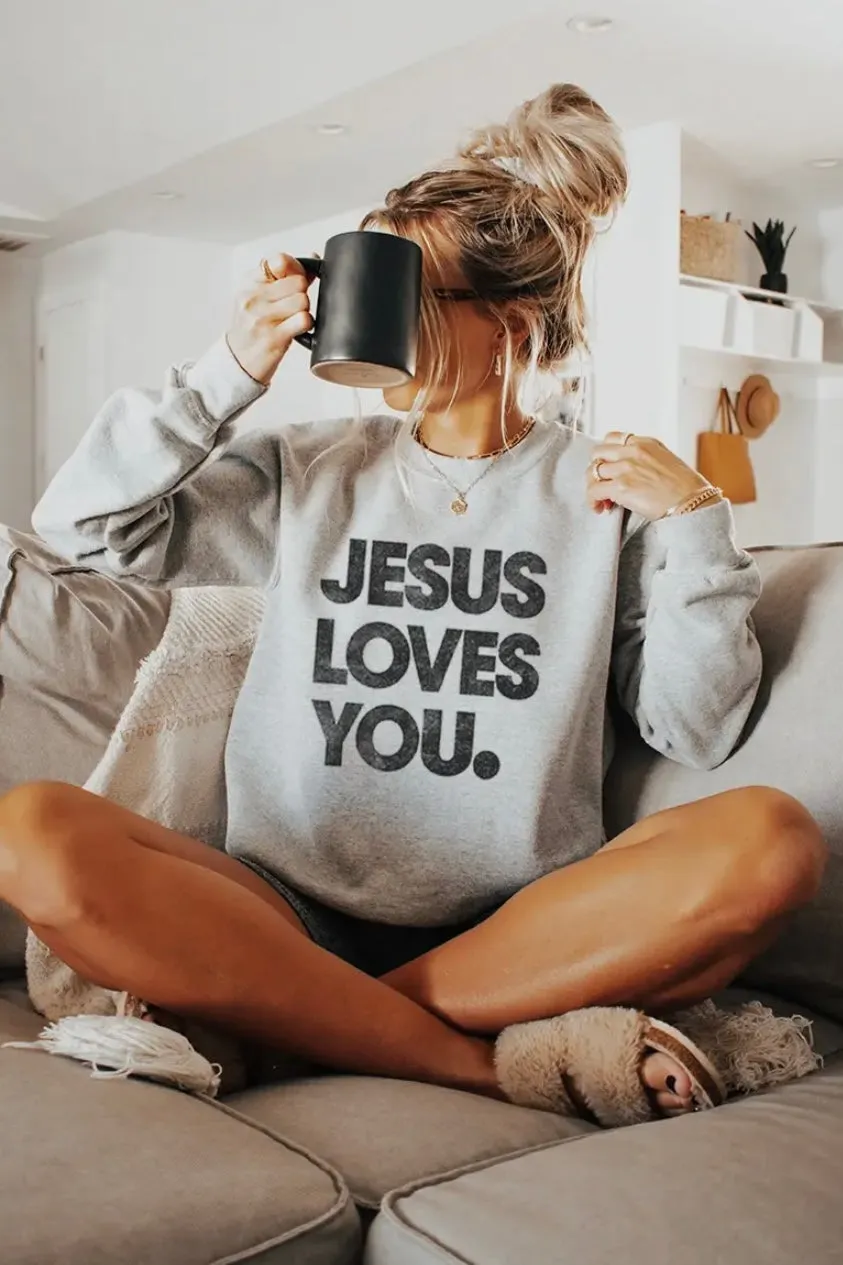 NEW!! “Jesus Loves You" Sweatshirt in Grey sold by Glitzy Bella