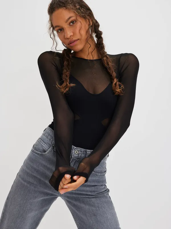 All An Illusion Bodysuit in Black made by Free People