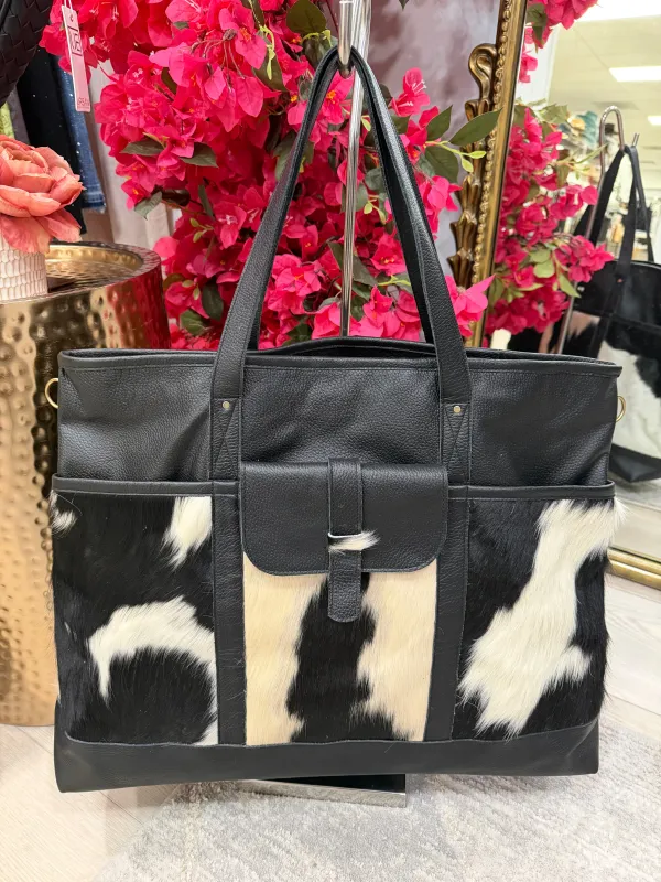 EXCLUSIVE!! Leather and Cowhide Travel Bag in Black & White sold by Glitzy Bella
