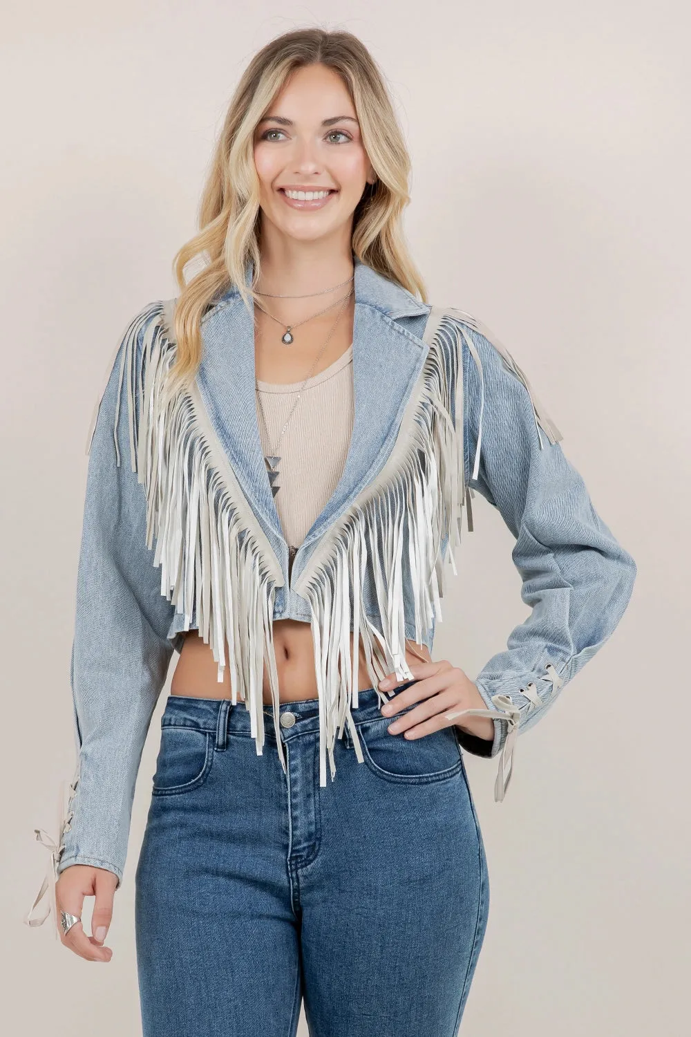 "Aspen" Cropped Fringe Denim Jacket in Light Wash sold by Glitzy Bella