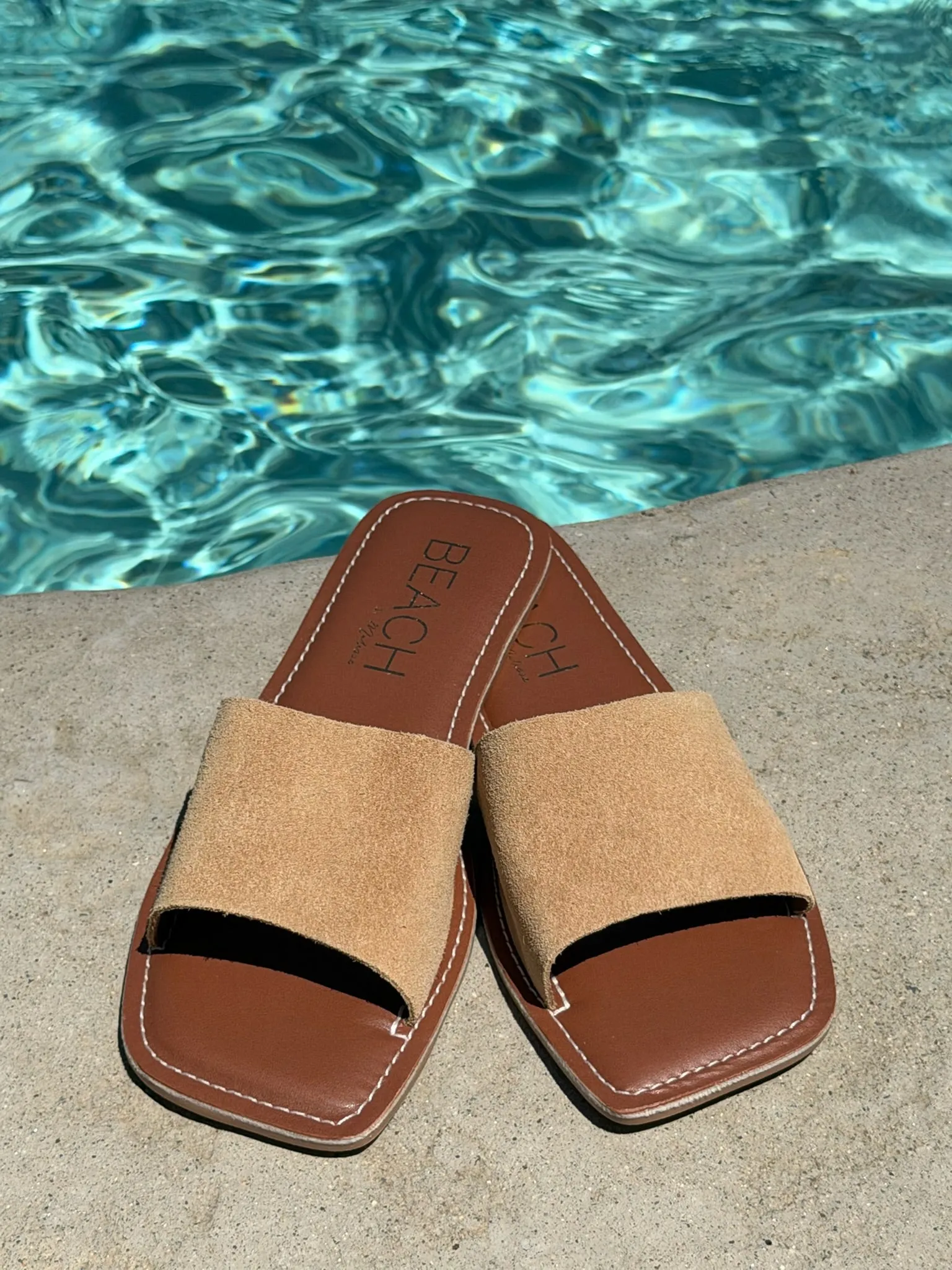 Bali Slide Sandal in Cream sold by Glitzy Bella