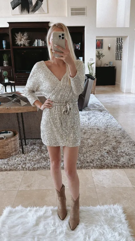 “Time to Shine” Sequin Wrap Dress sold by Glitzy Bella