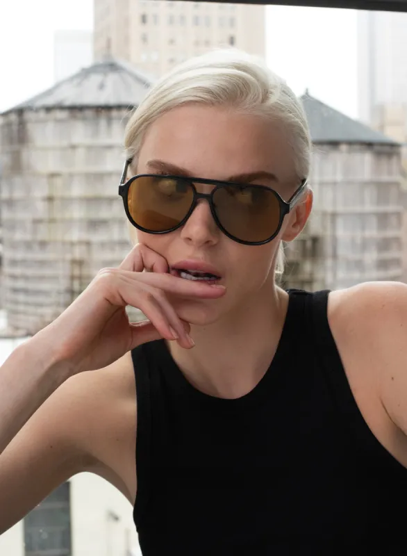 Stevie - Black/Olive sold by Otra Eyewear