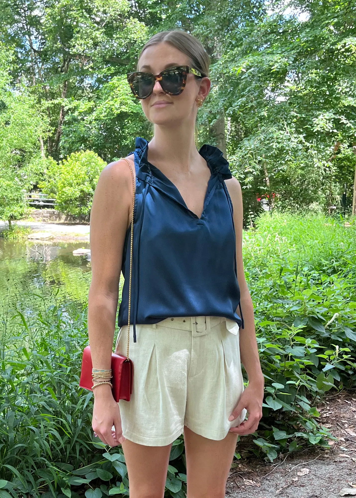 Gillian Ruffle Neck Top Navy Satin sold by Abbey Glass