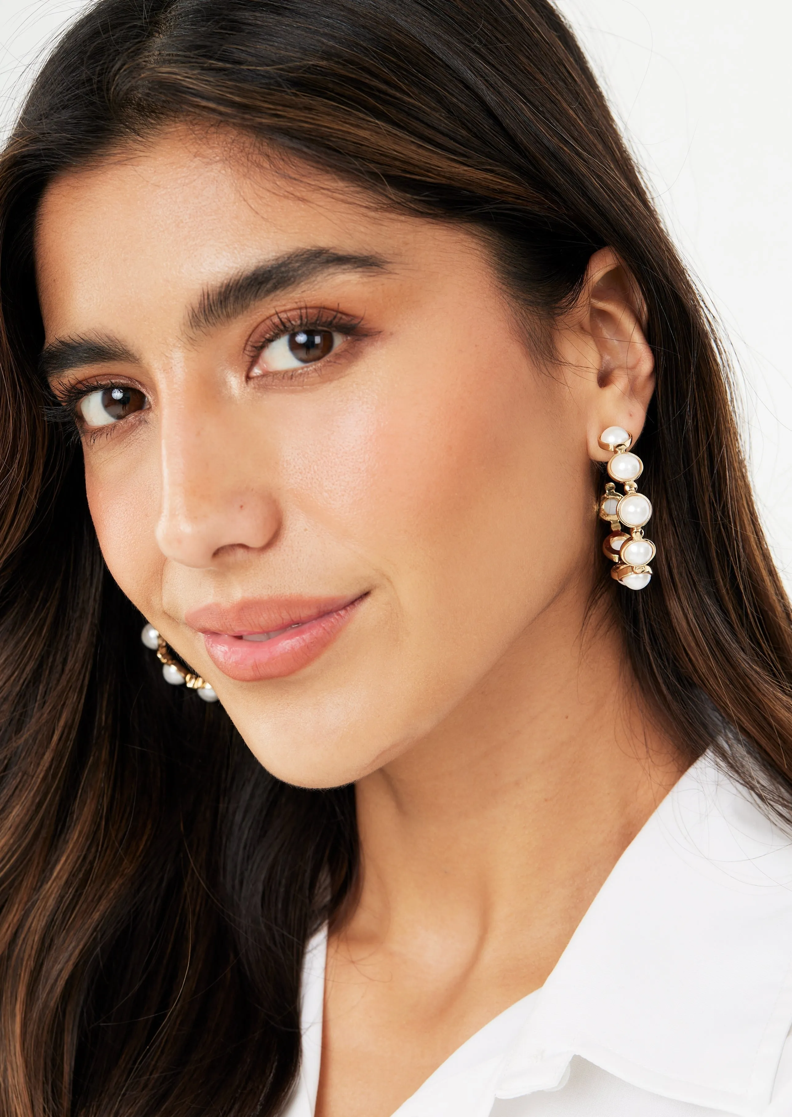 C shaped round pearl & metal hoops sold by Abbey Glass