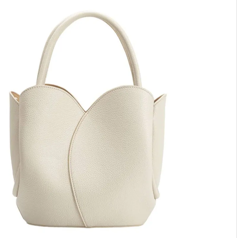 Tulip Bone Recycled Vegan Top Handle Bag sold by Abbey Glass