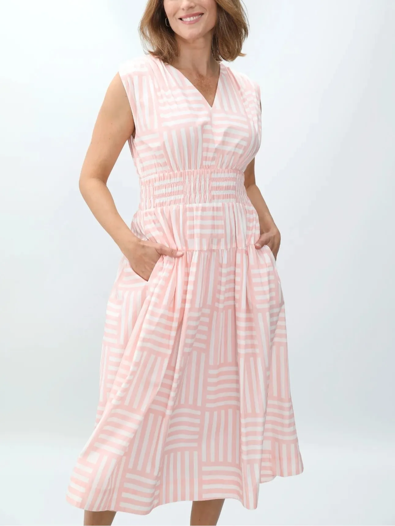 The Eva Dress in Pink Geo Stripe sold by Beau & Ro