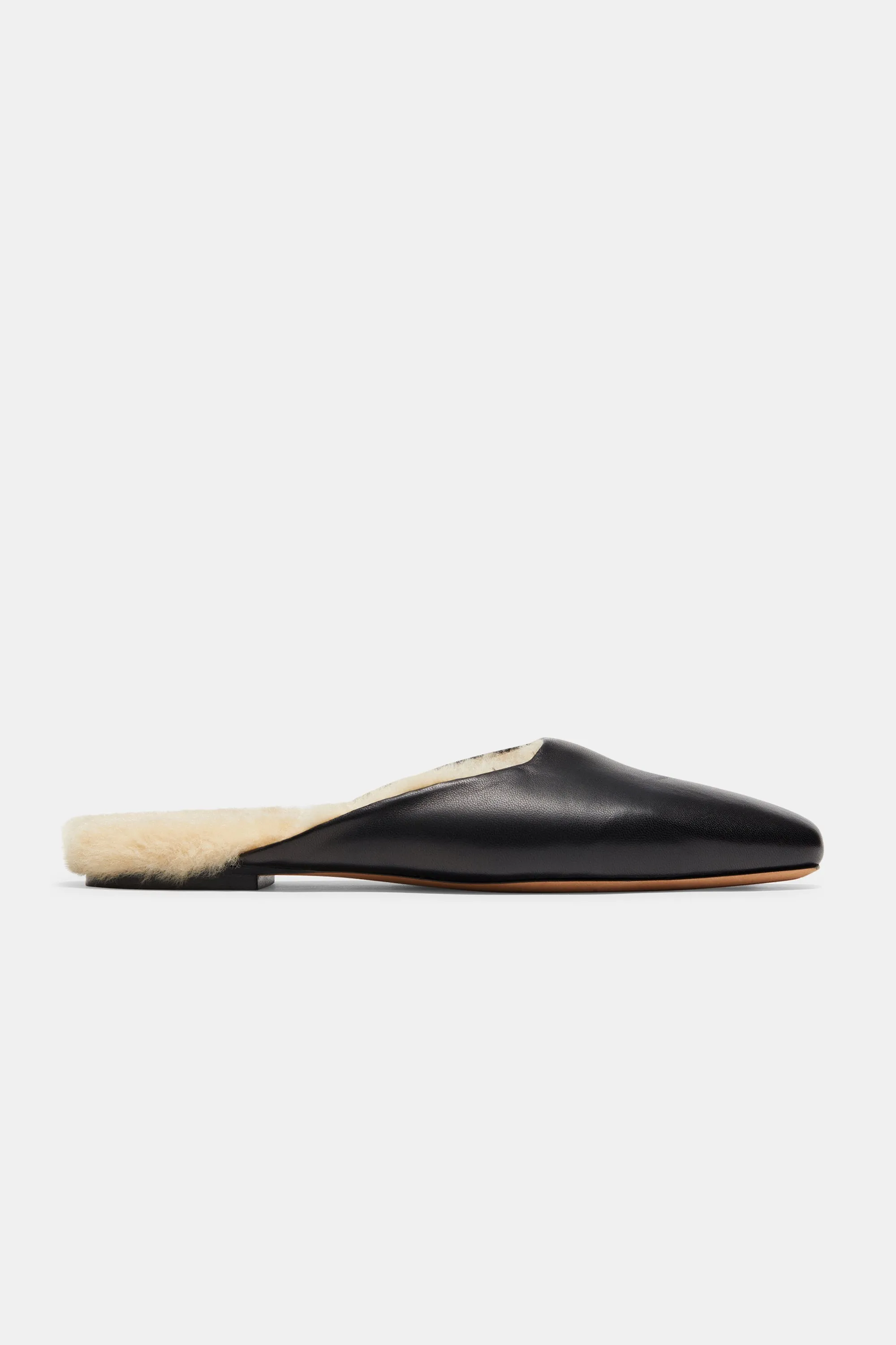 Flat Mule in Black Shearling Nappa sold by Emme Parsons