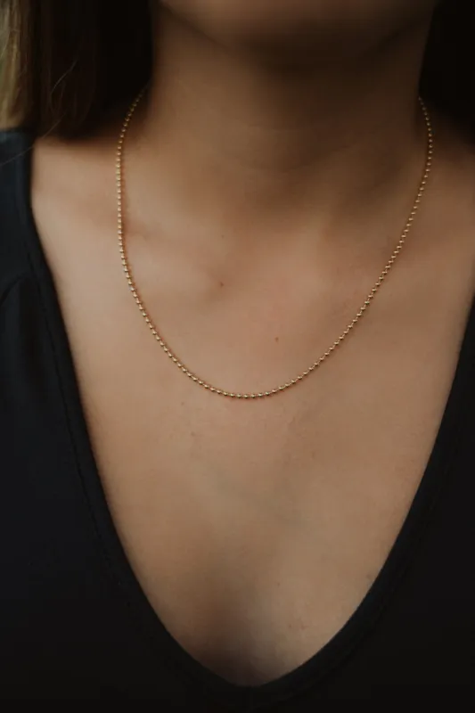 Gold Beaded Necklace sold by Goldie Lew