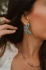 Claire | Large Turquoise and Silver Earrings sold by Goldie Lew
