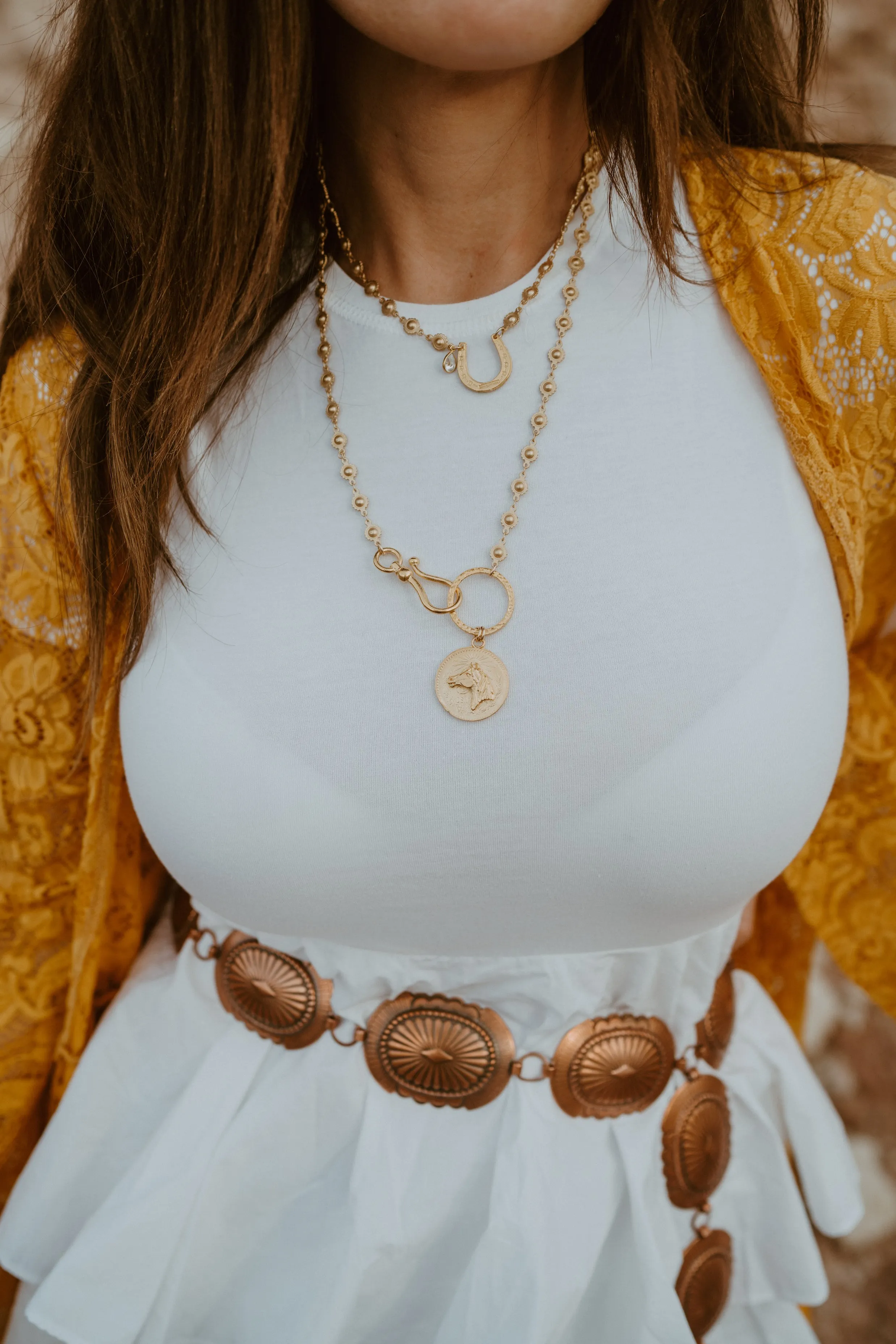 Gold Horse Necklace | Horseshoe Detail sold by Goldie Lew