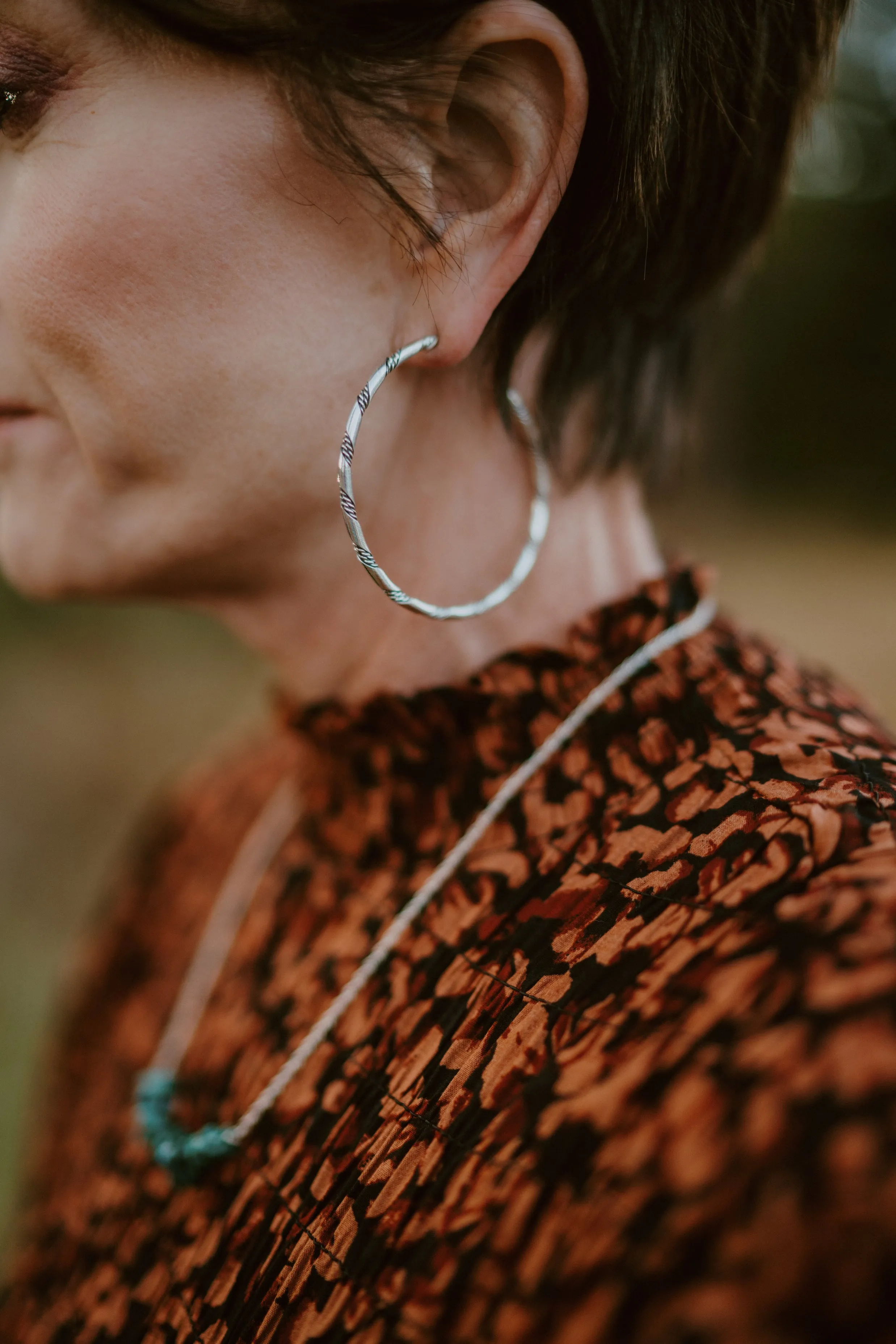 Large Twisted Hoop sold by Goldie Lew