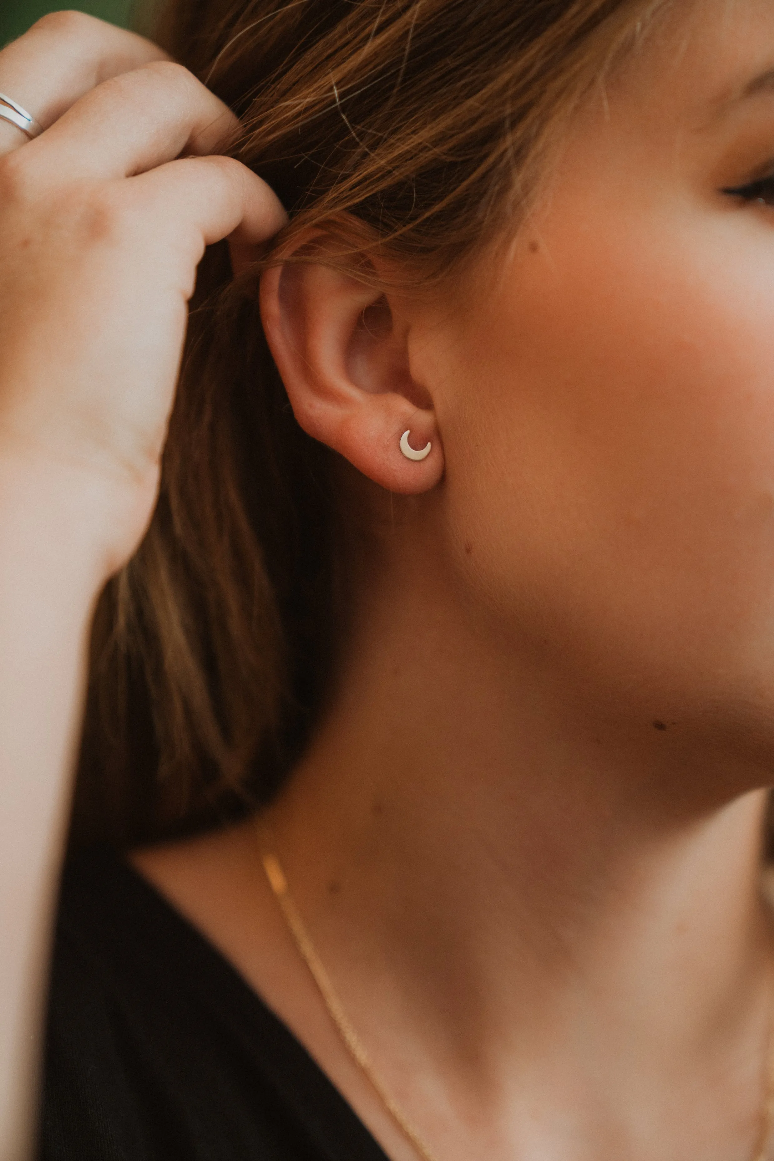 Gold Moon and Star Studs sold by Goldie Lew