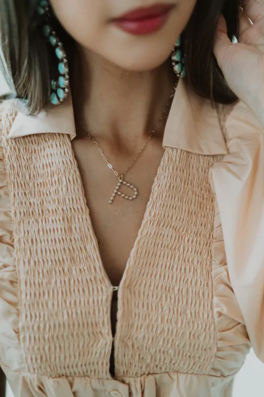 Pearl Initial Necklace sold by Goldie Lew