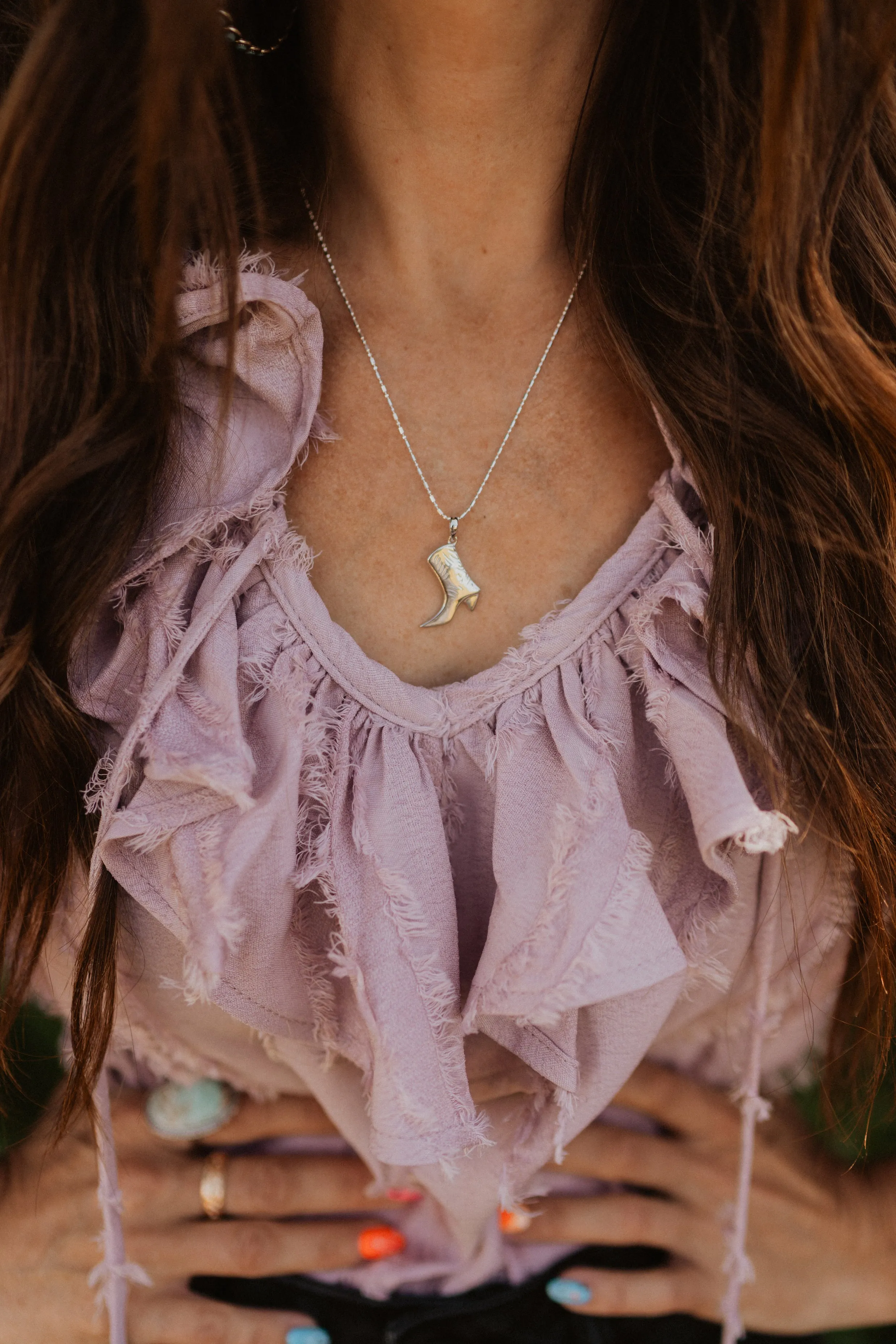 Silver Cowboy Boot sold by Goldie Lew