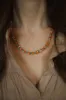 Orange It Up Necklace sold by Goldie Lew