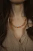 Orange It Up Necklace sold by Goldie Lew