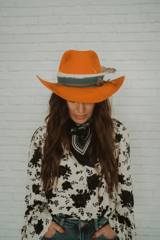 Orange Hat sold by Goldie Lew