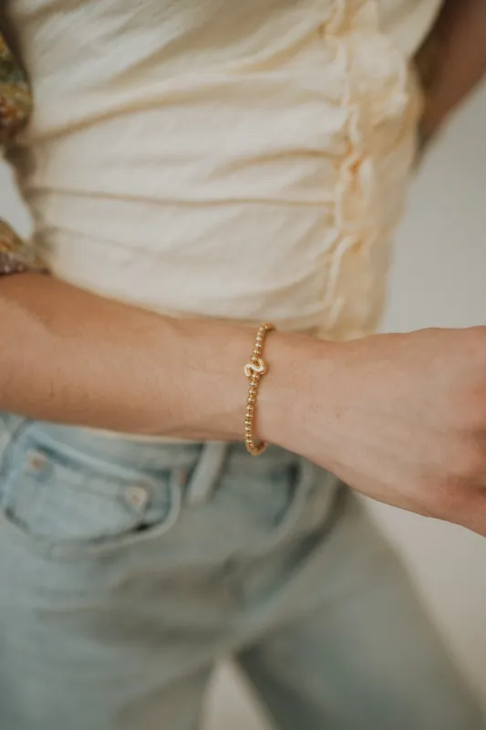 Gold Initial Bracelet sold by Goldie Lew