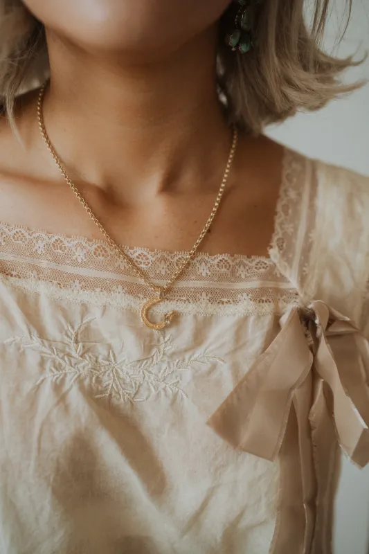 Matte Horseshoe Necklace sold by Goldie Lew