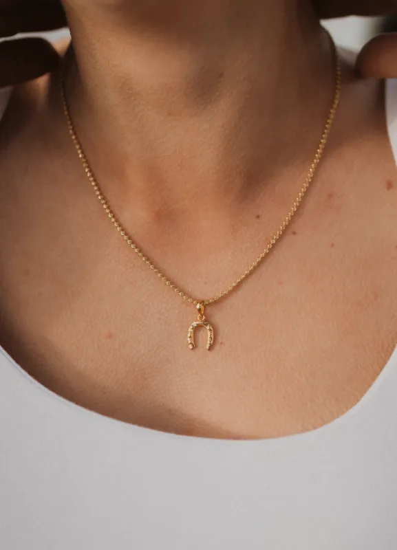 Dotted Horseshoe Necklace sold by Goldie Lew