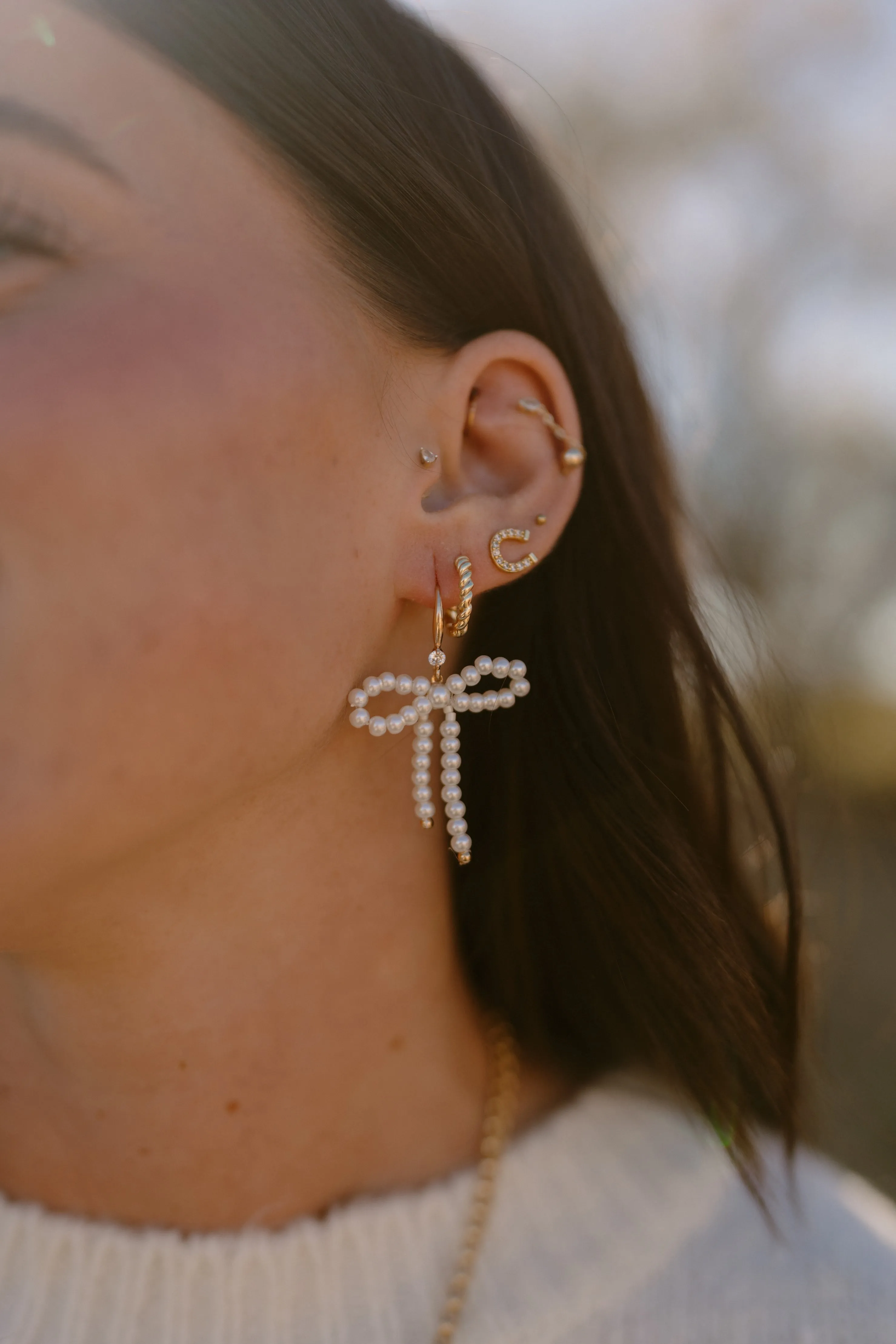 Bow + Glow Earrings sold by Goldie Lew