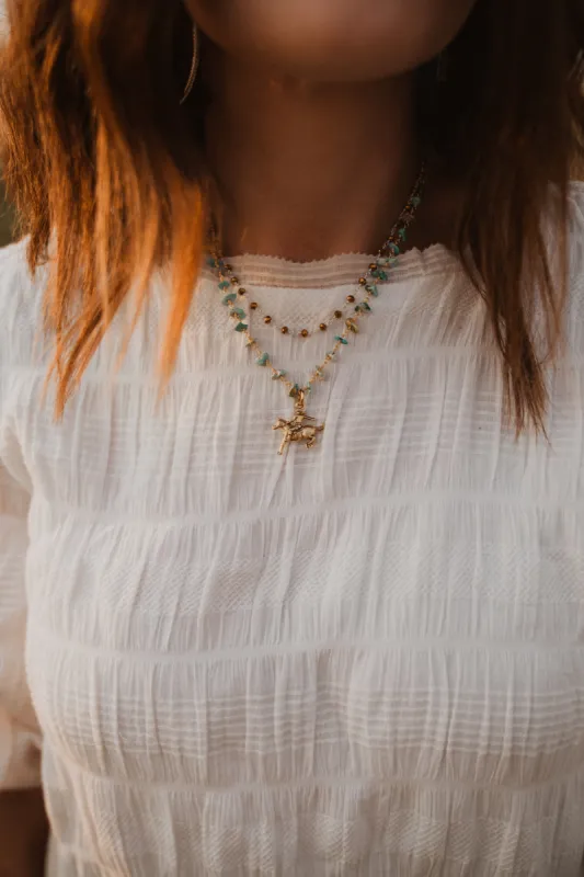 Golden Cowboy | Turquoise Chippy | Ember Choker sold by Goldie Lew