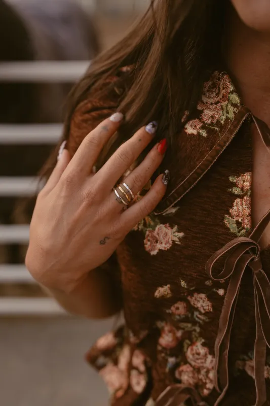 Swirl Ring | Silver + Gold sold by Goldie Lew