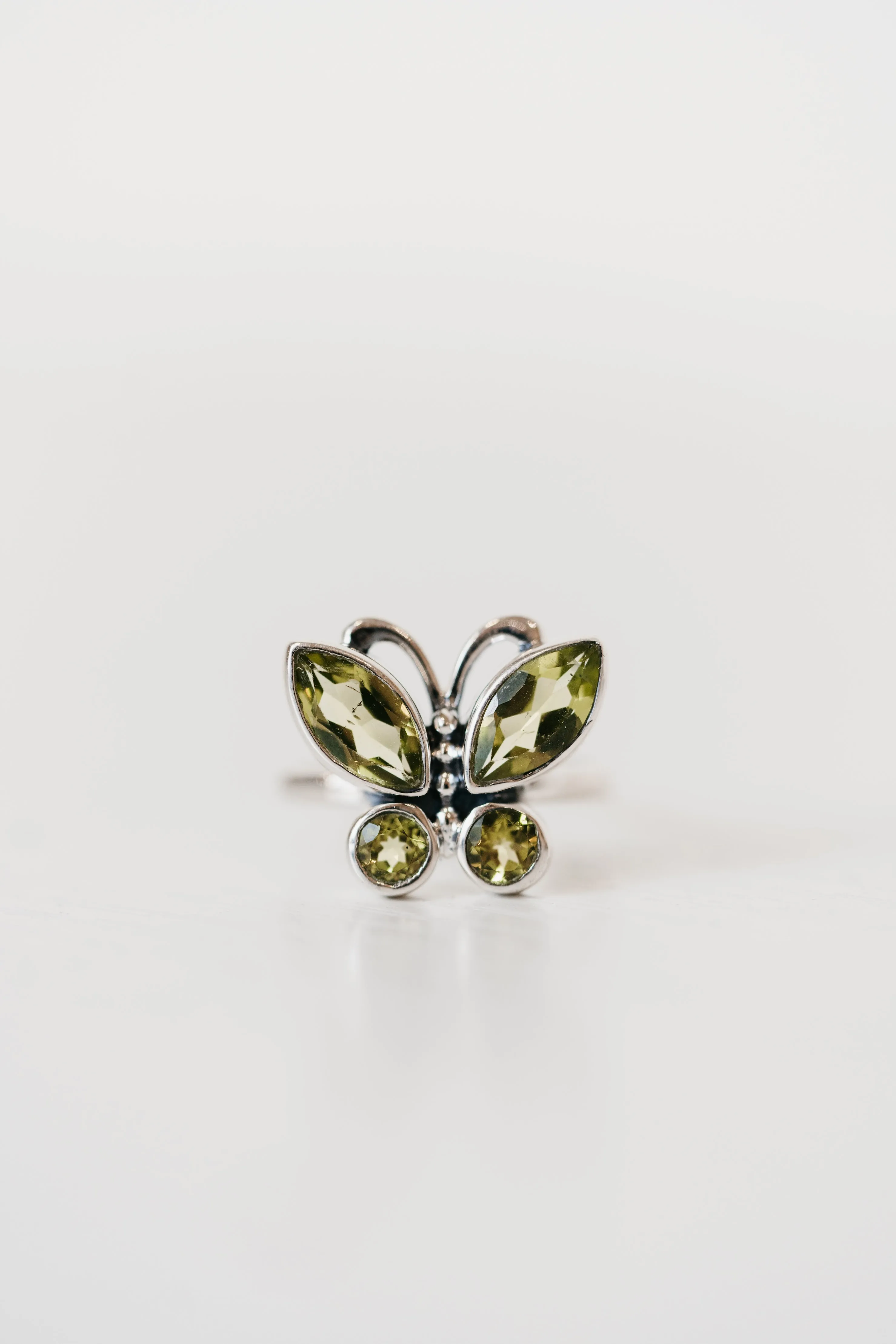 Flutter Ring | Green Peridot sold by Goldie Lew
