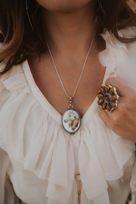 Los Caballos | Double Horse Head Pendant sold by Goldie Lew