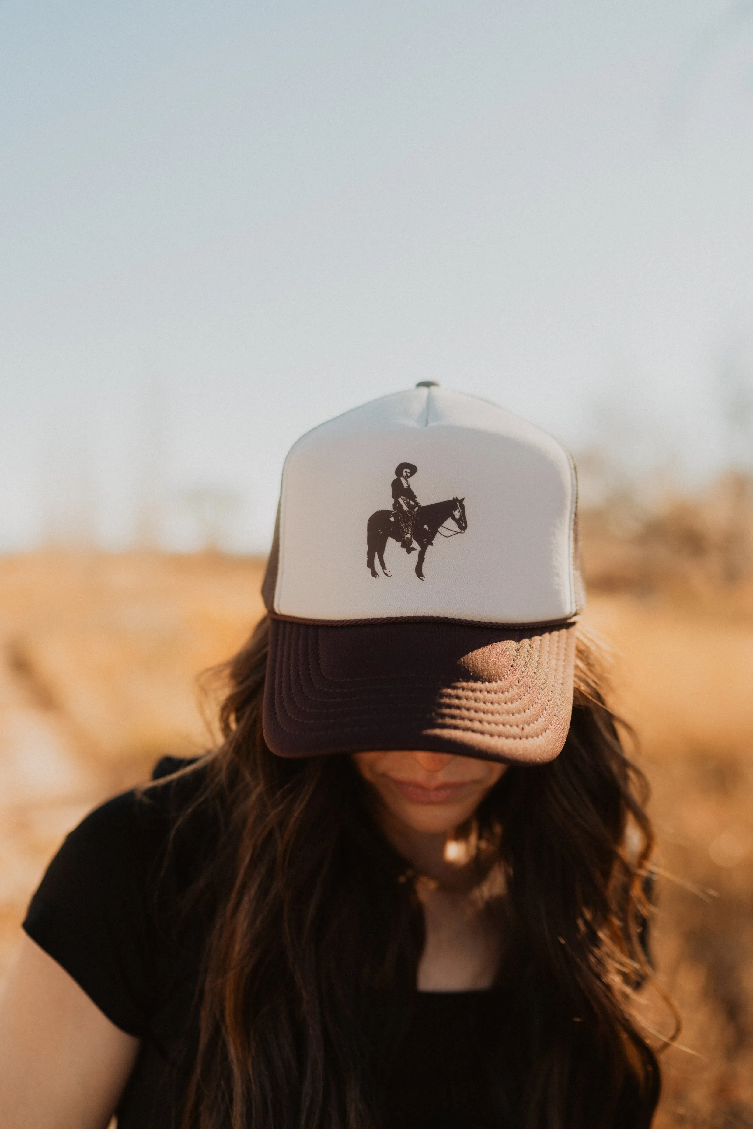 Curly Trucker Hat sold by Goldie Lew