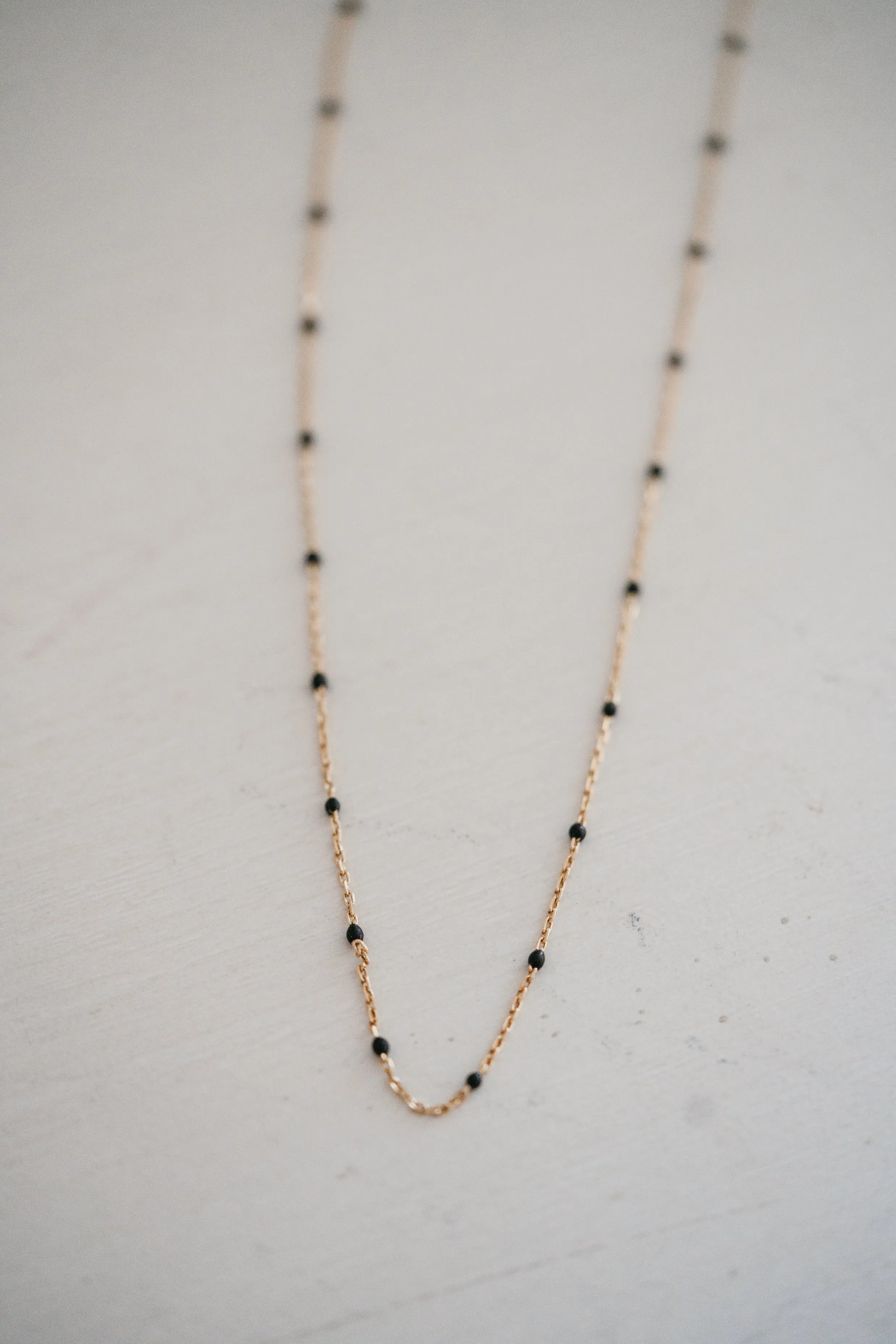 Maria Necklace | Gold + Black sold by Goldie Lew