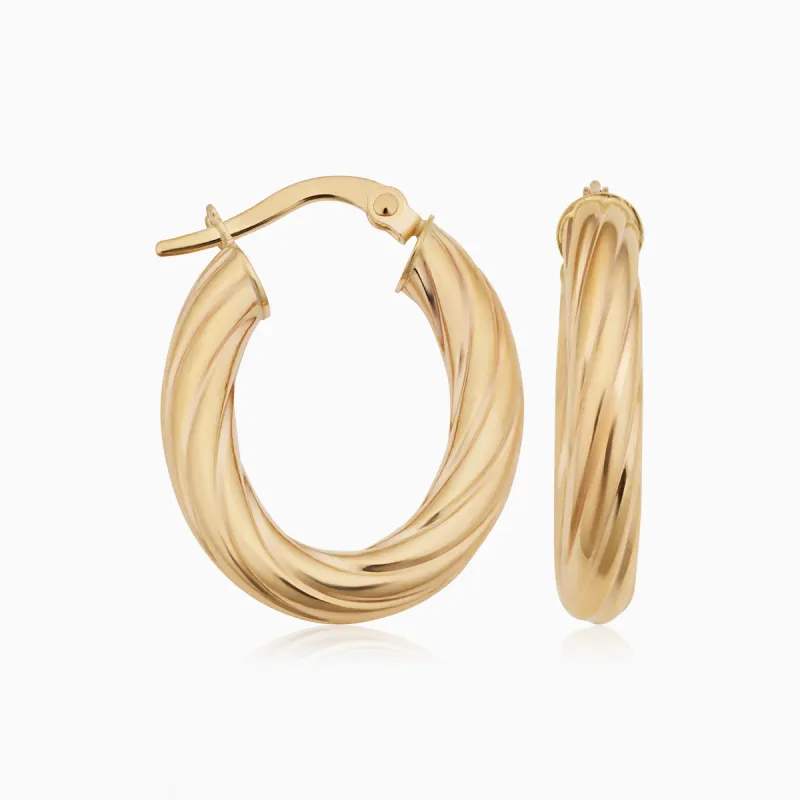 With a Twist Oval Hoops sold by Oradina