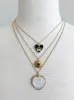 Eye of the Sun Necklace sold by Peggy Li Creations