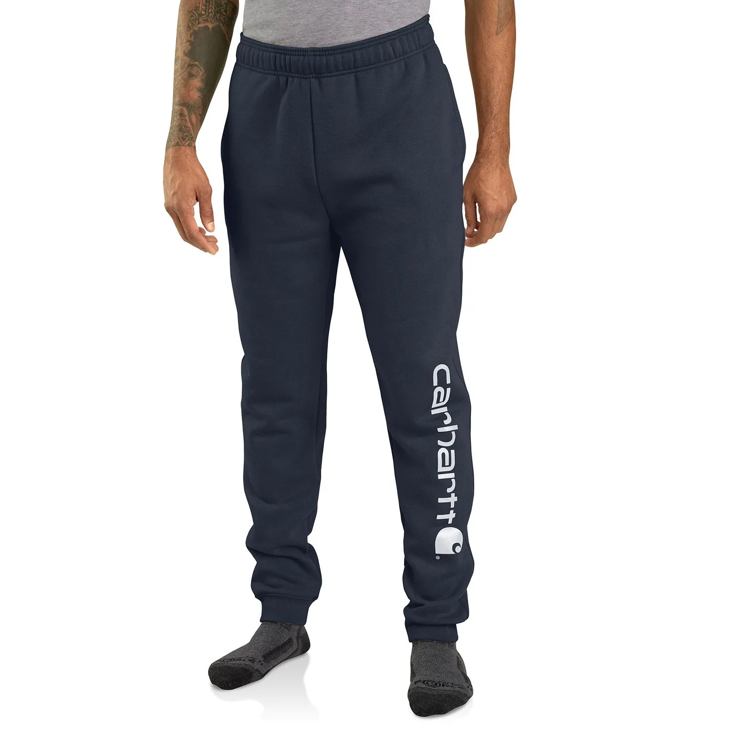Carhartt Men's Relaxed Fit Midweight Tapered Logo Sweatpant sold by Work World