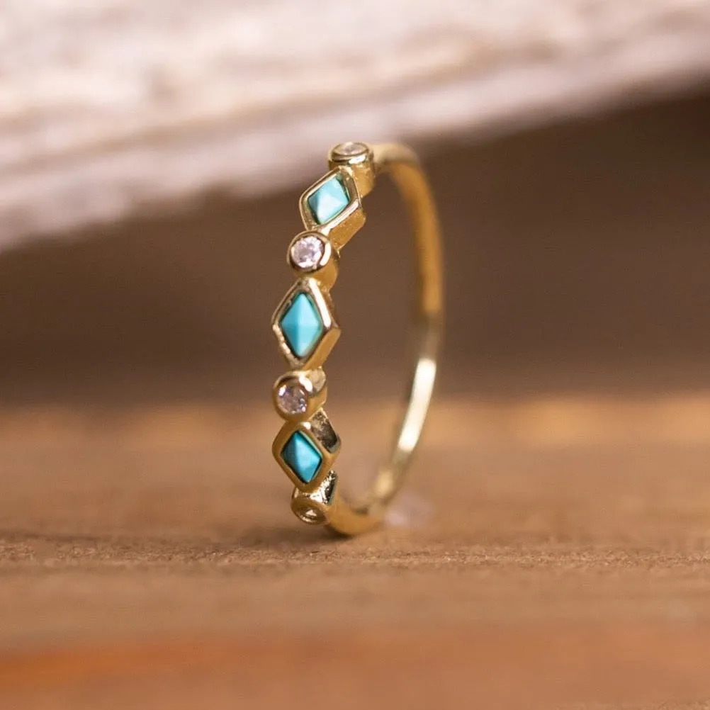 The Gold Tulum Stacking Band sold by Antler Rings