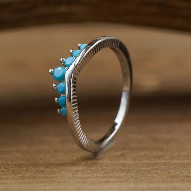 The Turquoise Wishbone Stacking Band sold by Antler Rings