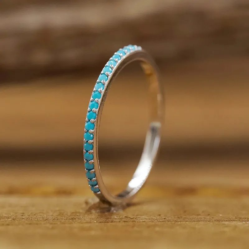 The Rose Atoll Stacking Band sold by Antler Rings