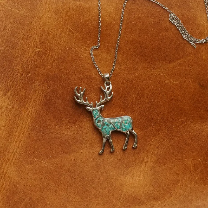 The Turquoise Stag sold by Antler Rings
