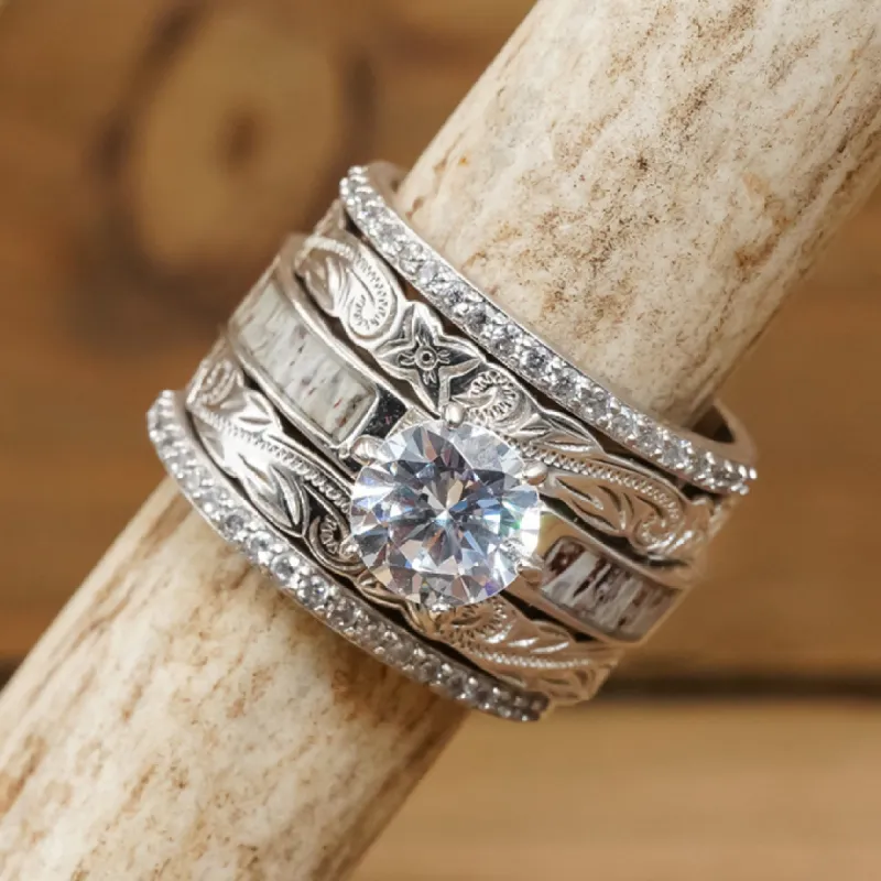 The Ribbon Falls Wedding Set sold by Antler Rings