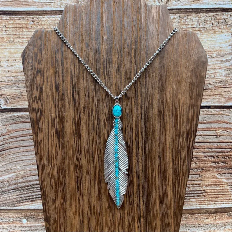 The Feather Pendant Necklace sold by Antler Rings
