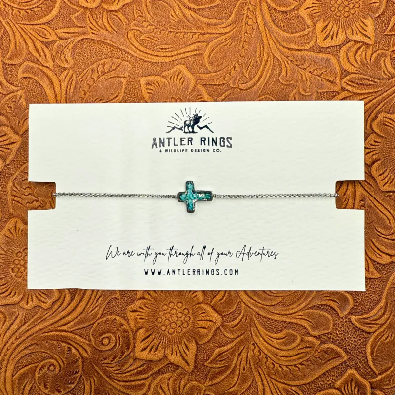 The Cross Bracelet sold by Antler Rings