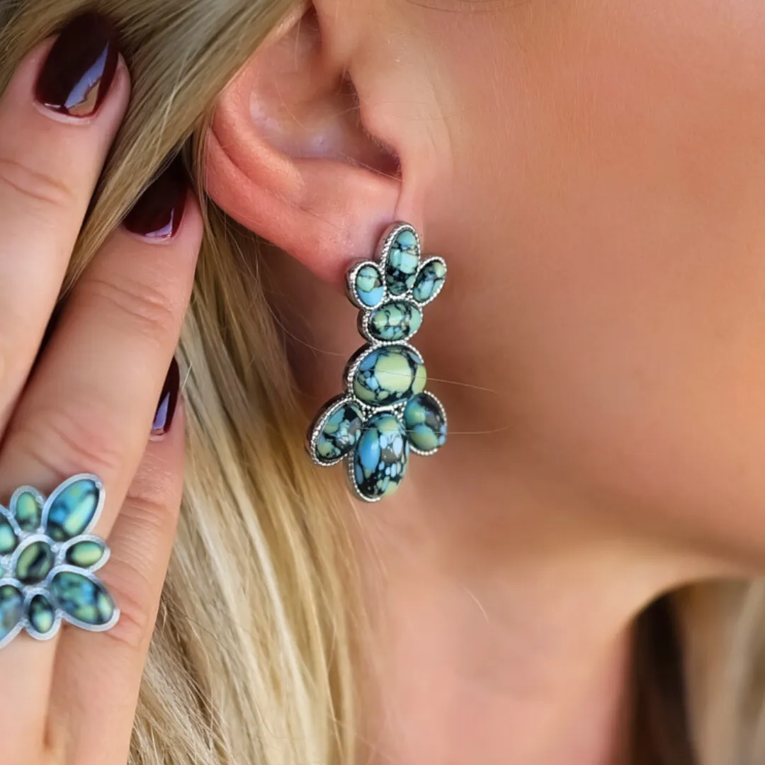 The Dumont Stud Earrings sold by Antler Rings