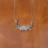 The Antler & Floral Necklace sold by Antler Rings