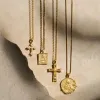 Enamel Cross Amulet sold by Awe Inspired