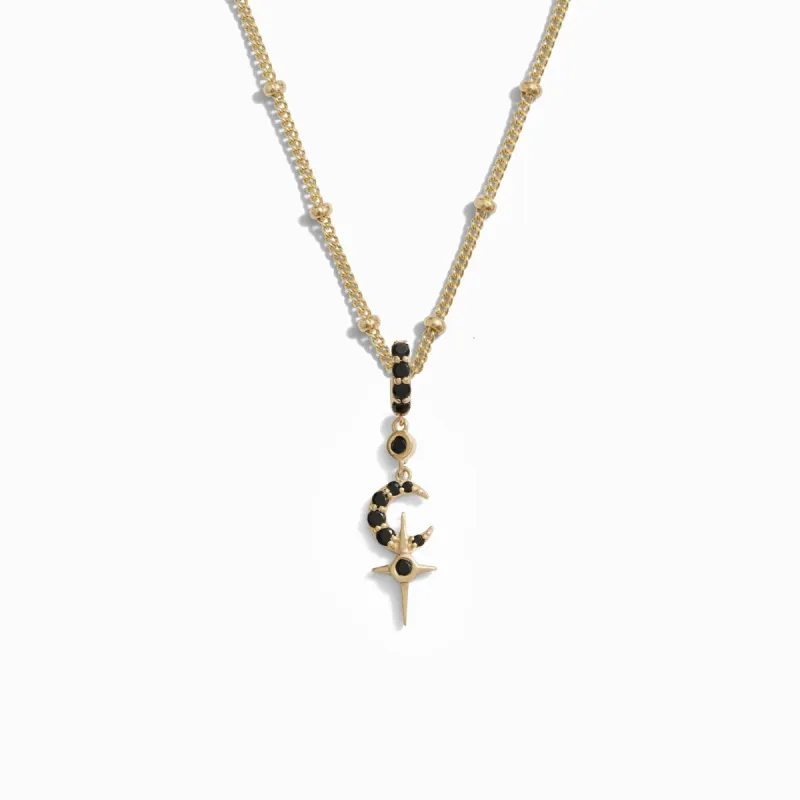 Black Spinel Crescent Cross Necklace sold by Awe Inspired