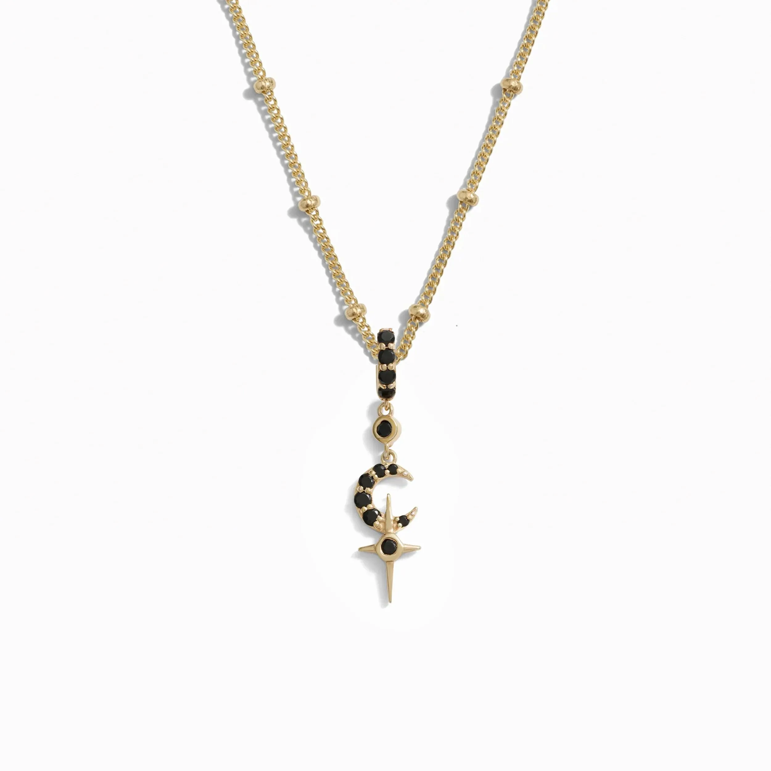 Black Spinel Crescent Cross Necklace sold by Awe Inspired